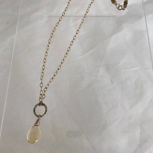 Necklace with clear yellow stone